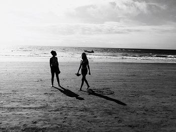 Men playing on beach
