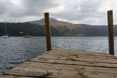 Pier over sea against sky