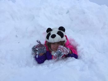 Fallen girl crying on snow