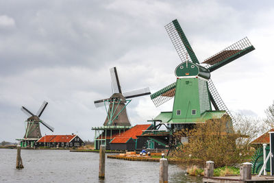 Traditional windmill against sky