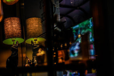 Close-up of illuminated lighting equipment at store