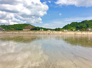 Scenic view of beach against sky