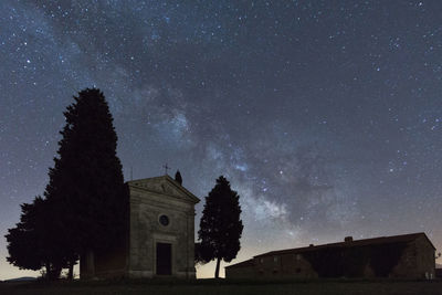 Low angle view of building against sky at night