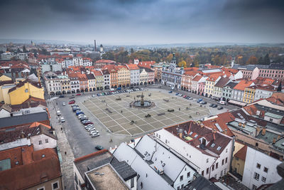 Town square against cloudy sky