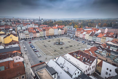 Cityscape against cloudy sky