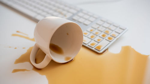 High angle view of coffee cup on table