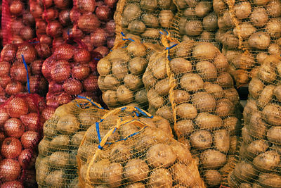 Stack of potato and onion sacks