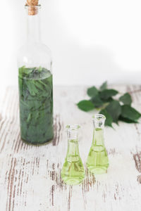Close-up of glass bottles on table