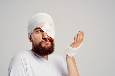 Portrait of man against white background