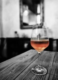 Close-up of wineglass on table