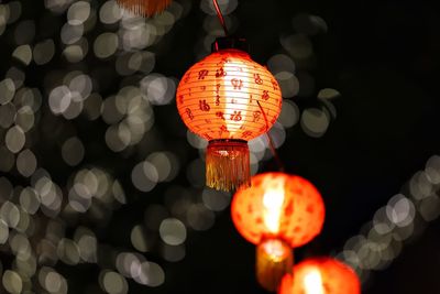 Low angle view of illuminated chandelier