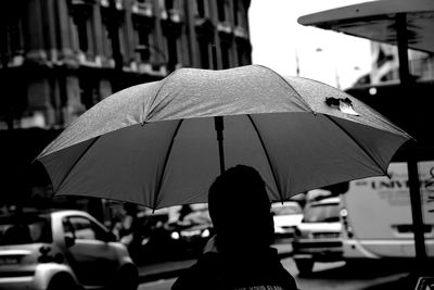 Man with umbrella in rain