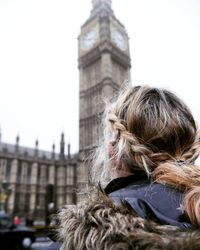 Rear view of woman against big ben