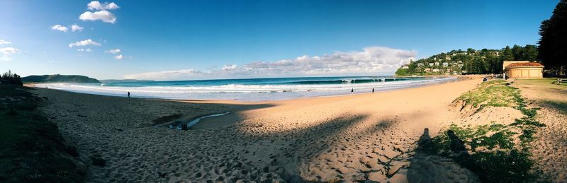 Scenic view of beach against sky