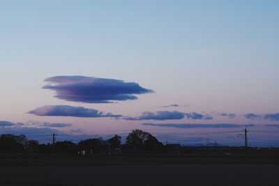 Scenic view of silhouette landscape against sky at sunset