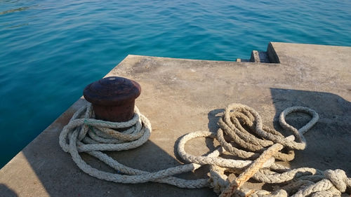 High angle view of rope on shore