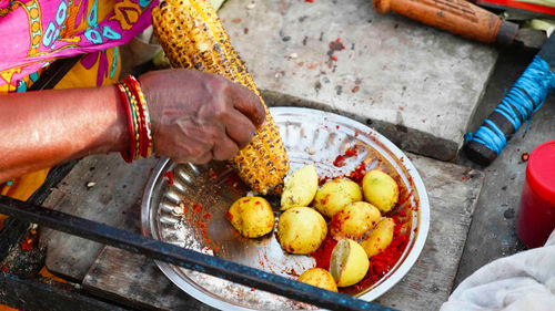 Midsection of woman preparing food