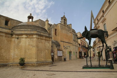 Exterior of historic building against sky