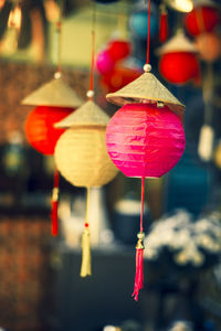 Close-up of lantern hanging against blurred background