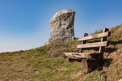 Take a break on a wooden park bench with a great view