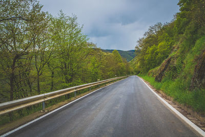 Country road passing through landscape