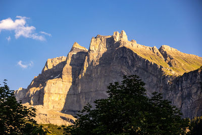 Panoramic view of rocky mountains against sky