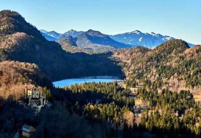 Hochenschwangau castle in germany surrounded by mountains. landscape, scenic.