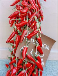 Close-up of red chili peppers on table