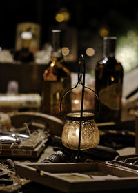 Close-up of wine bottles on table