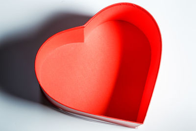 Close-up of red over white background