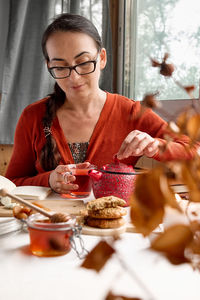 Midsection of woman holding food