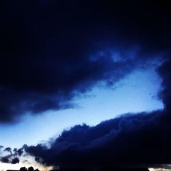 Low angle view of dramatic sky over sea