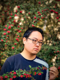 Portrait of young man looking away