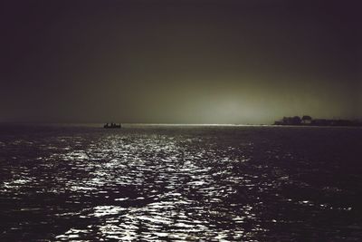 Scenic view of sea at sunset