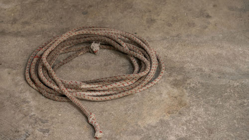 High angle view of rope on sand