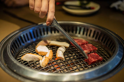 Close-up of person preparing food