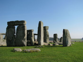 Built structure on field against clear sky