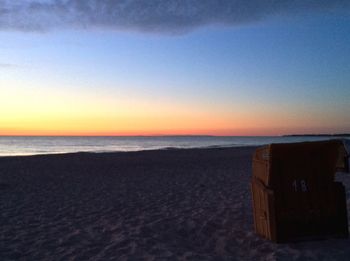 Scenic view of sea against clear sky during sunset