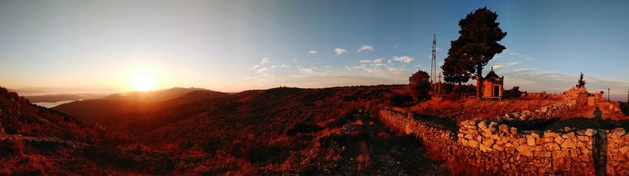 Panoramic view of mountains against sky during sunset