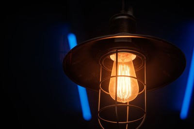 Close-up of illuminated light bulb