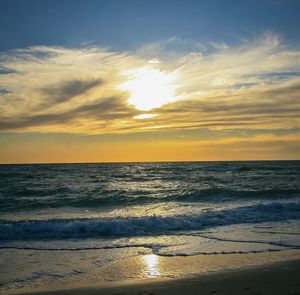 Scenic view of sea at sunset