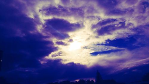 Low angle view of dramatic sky at sunset