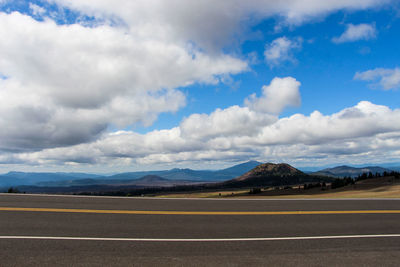 Road against cloudy sky