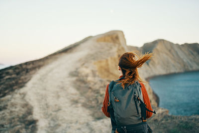Rear view of woman looking at mountain