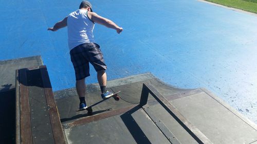 Full length of woman jumping in mid-air