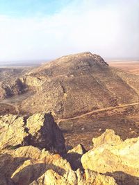 Scenic view of rock formations against sky