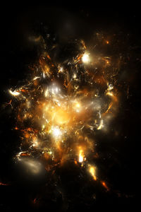 Low angle view of firework display at night
