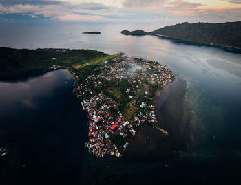 High angle view of city at sunset