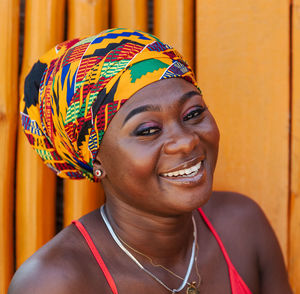 Close-up portrait of a smiling young woman