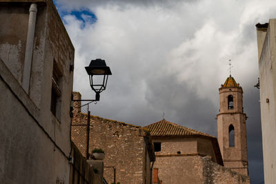 Low angle view of old building against sky